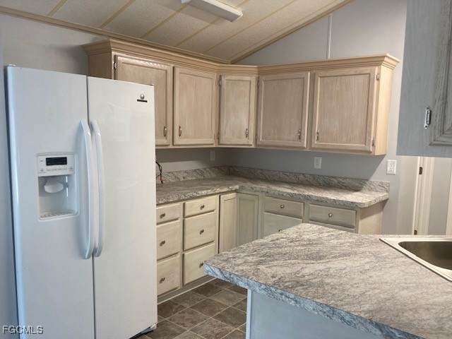 19681 Summerlin Road, Unit J197 Fort Myers, FL 33908 - Photo 7 of 22 a kitchen with granite countertop a refrigerator sink and cabinets