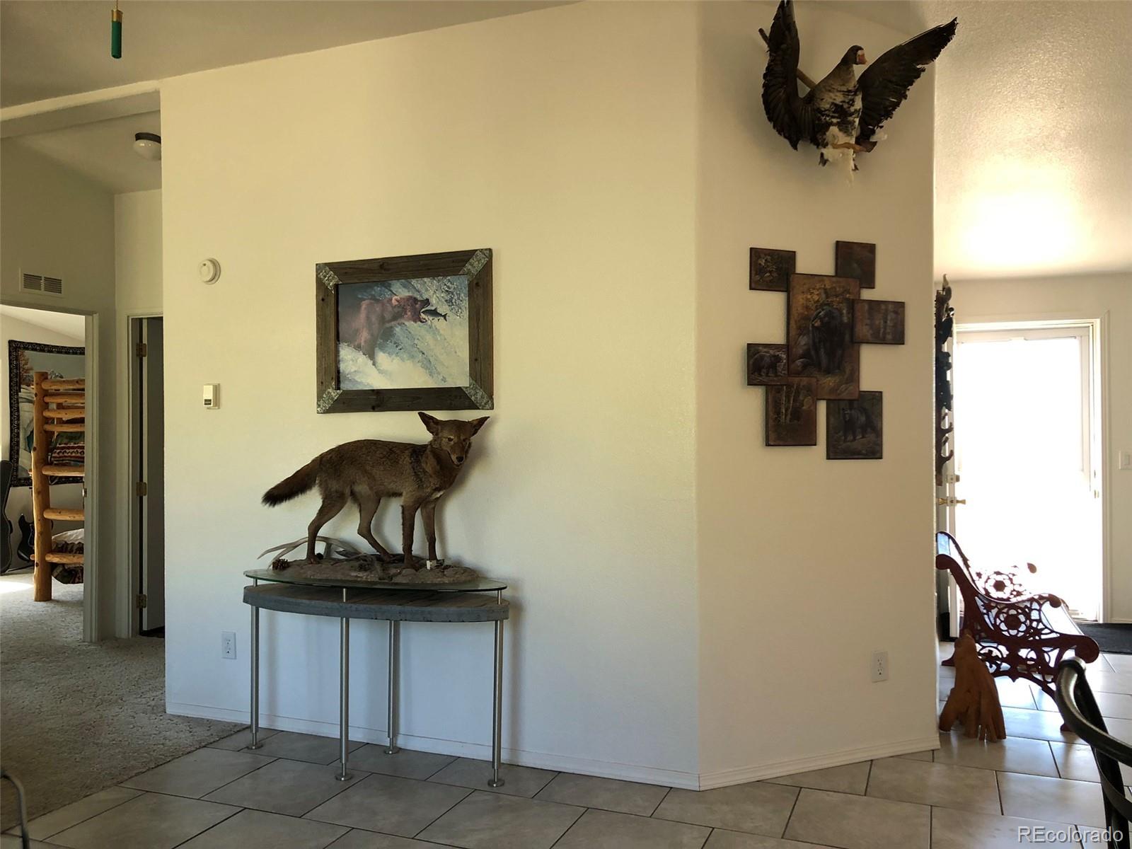 1983 Arapahoe Road Hartsel, CO 80449 - Photo 27 of 39 a view of a hallway with workspace