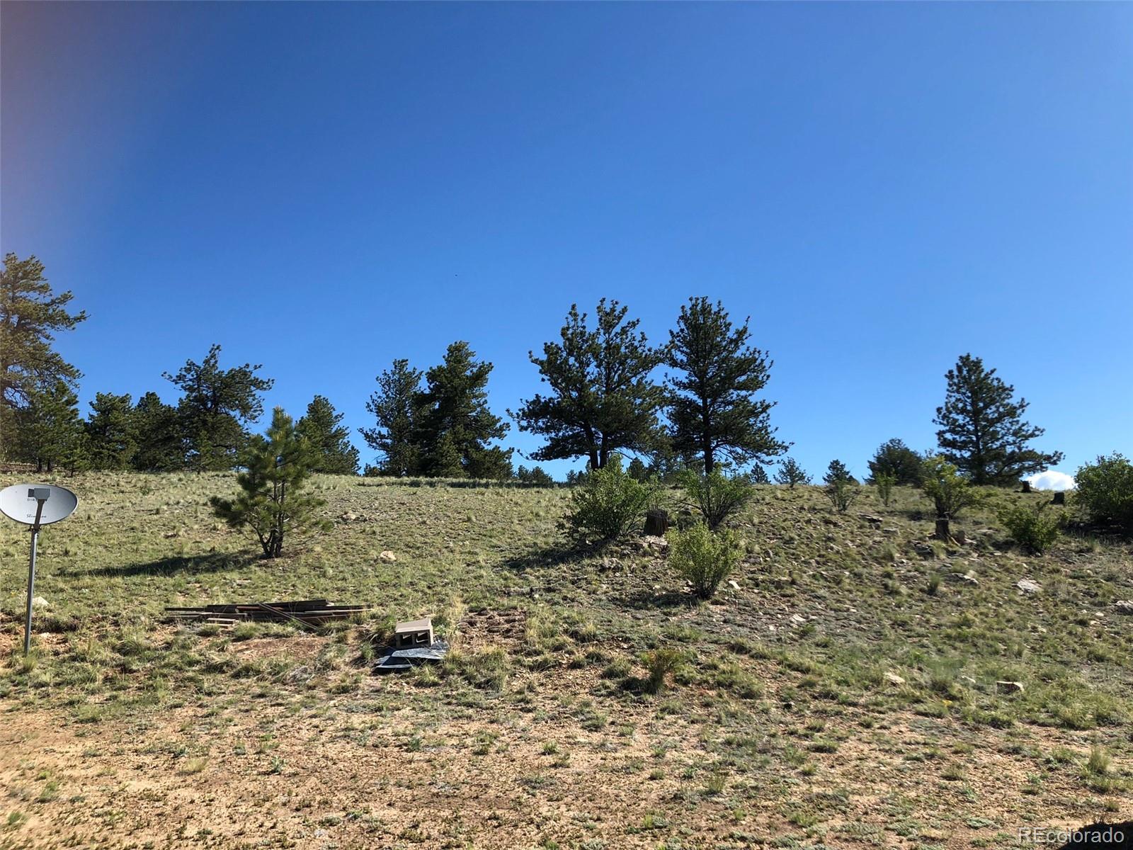 1983 Arapahoe Road Hartsel, CO 80449 - Photo 36 of 39 a view of a yard with wooden fence