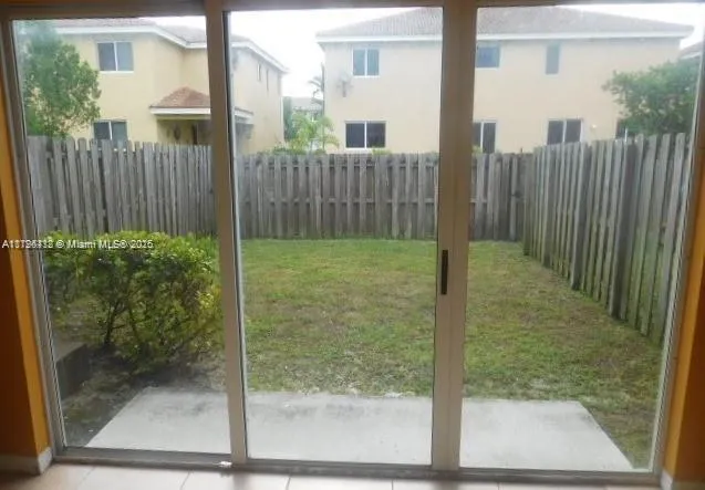 a bathroom with a glass door