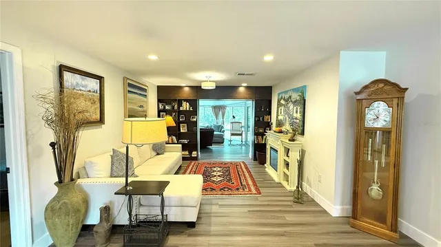 a living room with furniture and a table