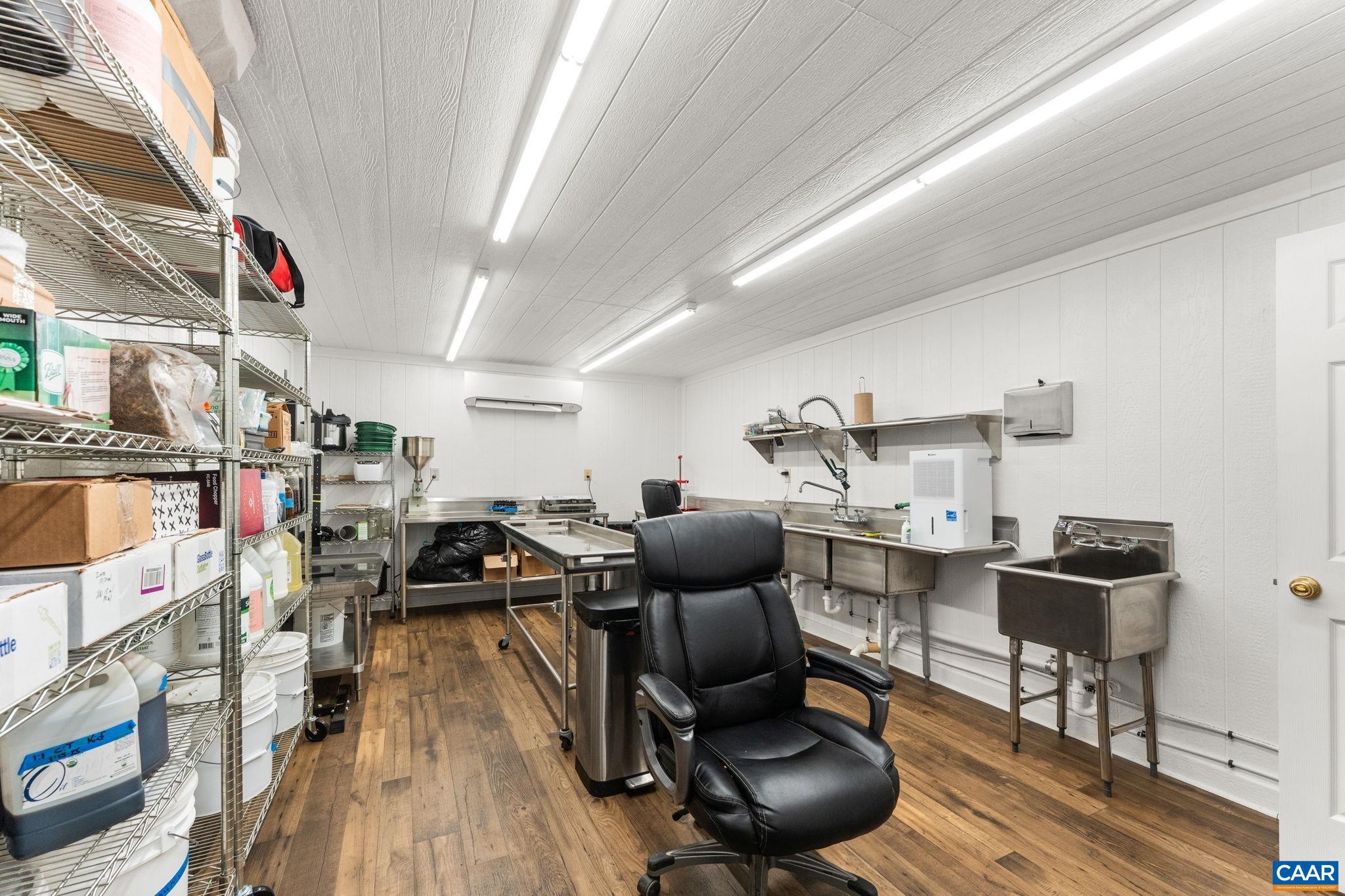 12145 South Constitution Route Scottsville, VA 24590 - Photo 18 of 22 a workspace with furniture