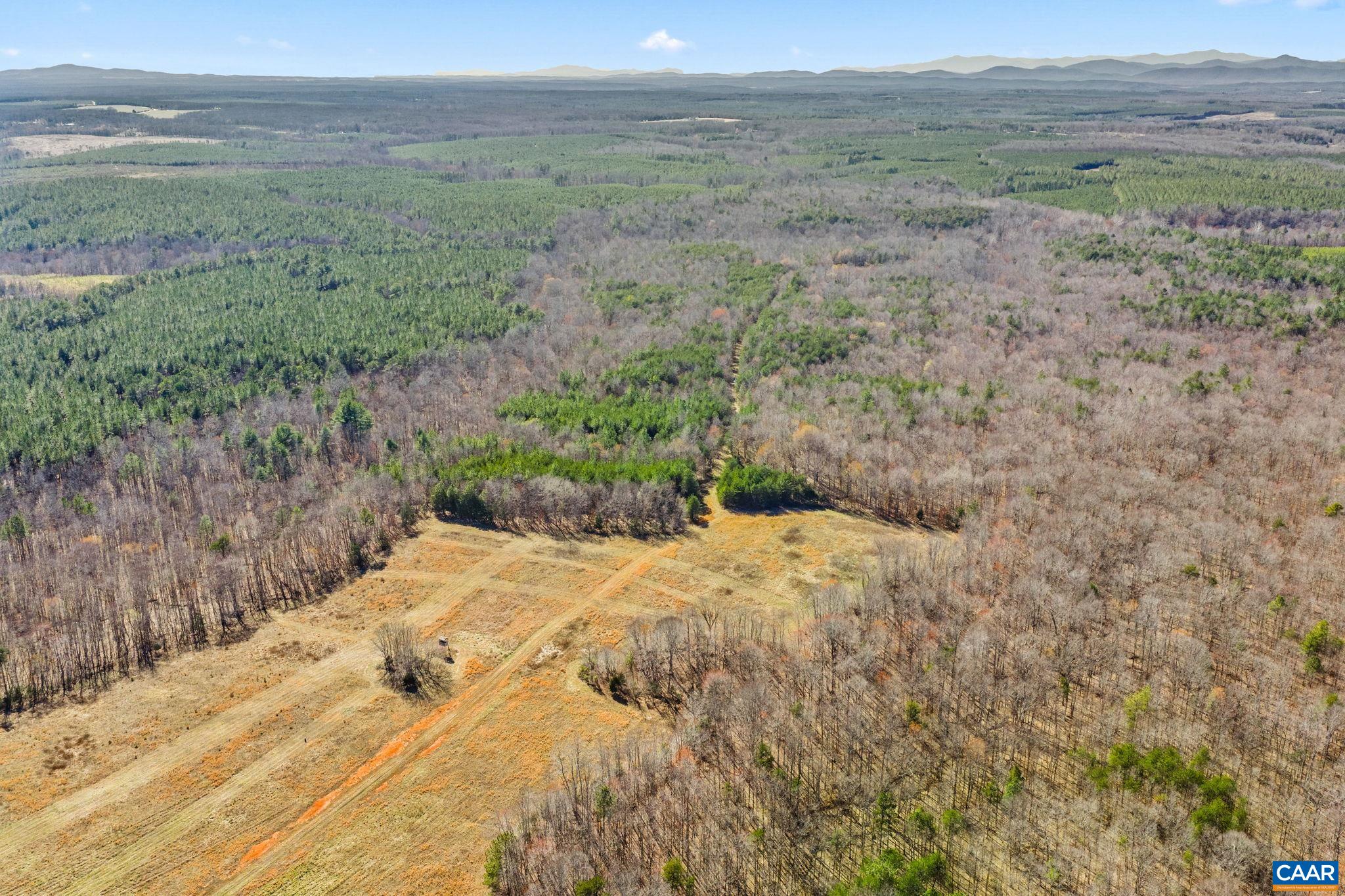 12145 South Constitution Route Scottsville, VA 24590 - Photo 2 of 22 a view of an outdoor space with wooden fence