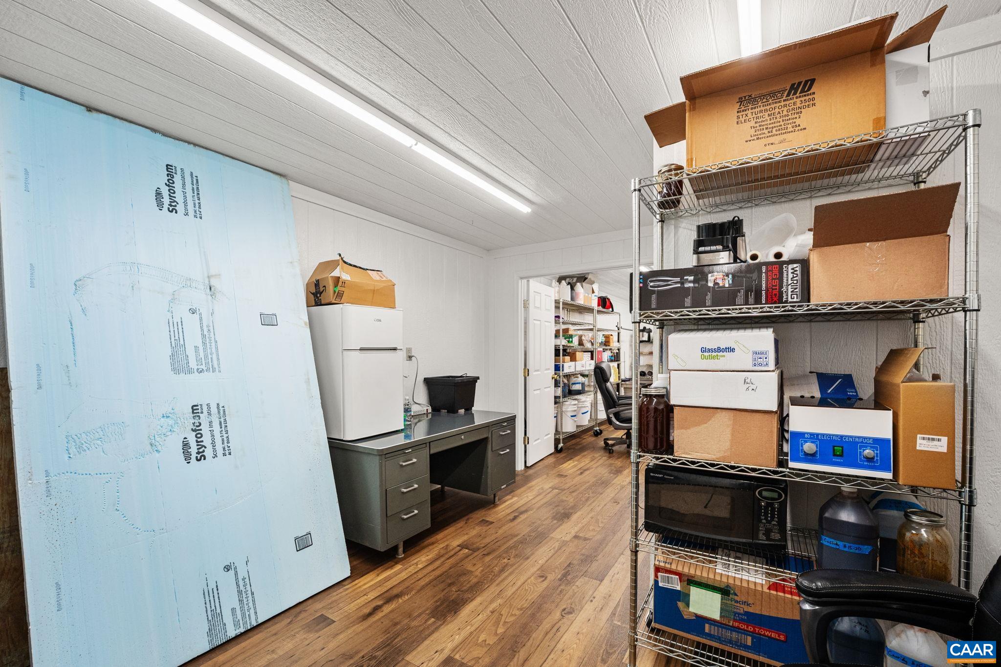 12145 South Constitution Route Scottsville, VA 24590 - Photo 22 of 22 a view of kitchen filled with furniture and wooden floor
