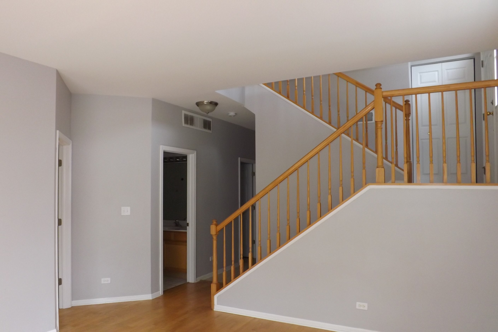 1237 Georgetown Way Vernon Hills, IL 60061 - Photo 15 of 16 a view of staircase with railing and white walls