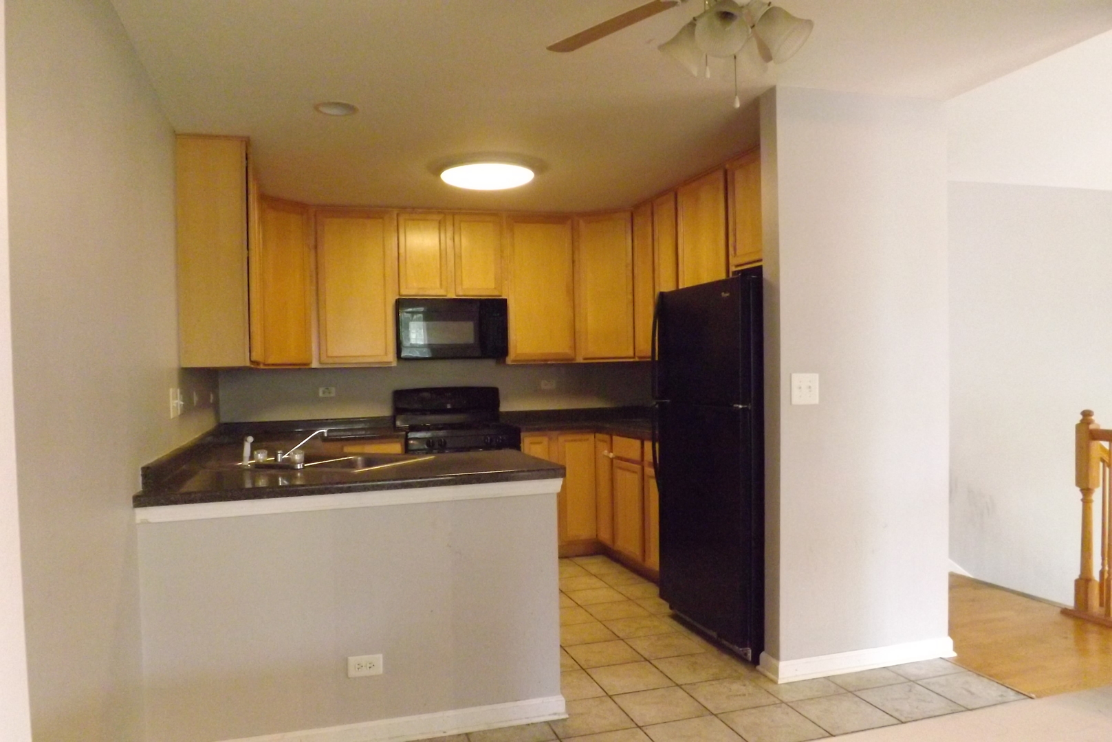 1237 Georgetown Way Vernon Hills, IL 60061 - Photo 9 of 16 a kitchen with a refrigerator stove and microwave