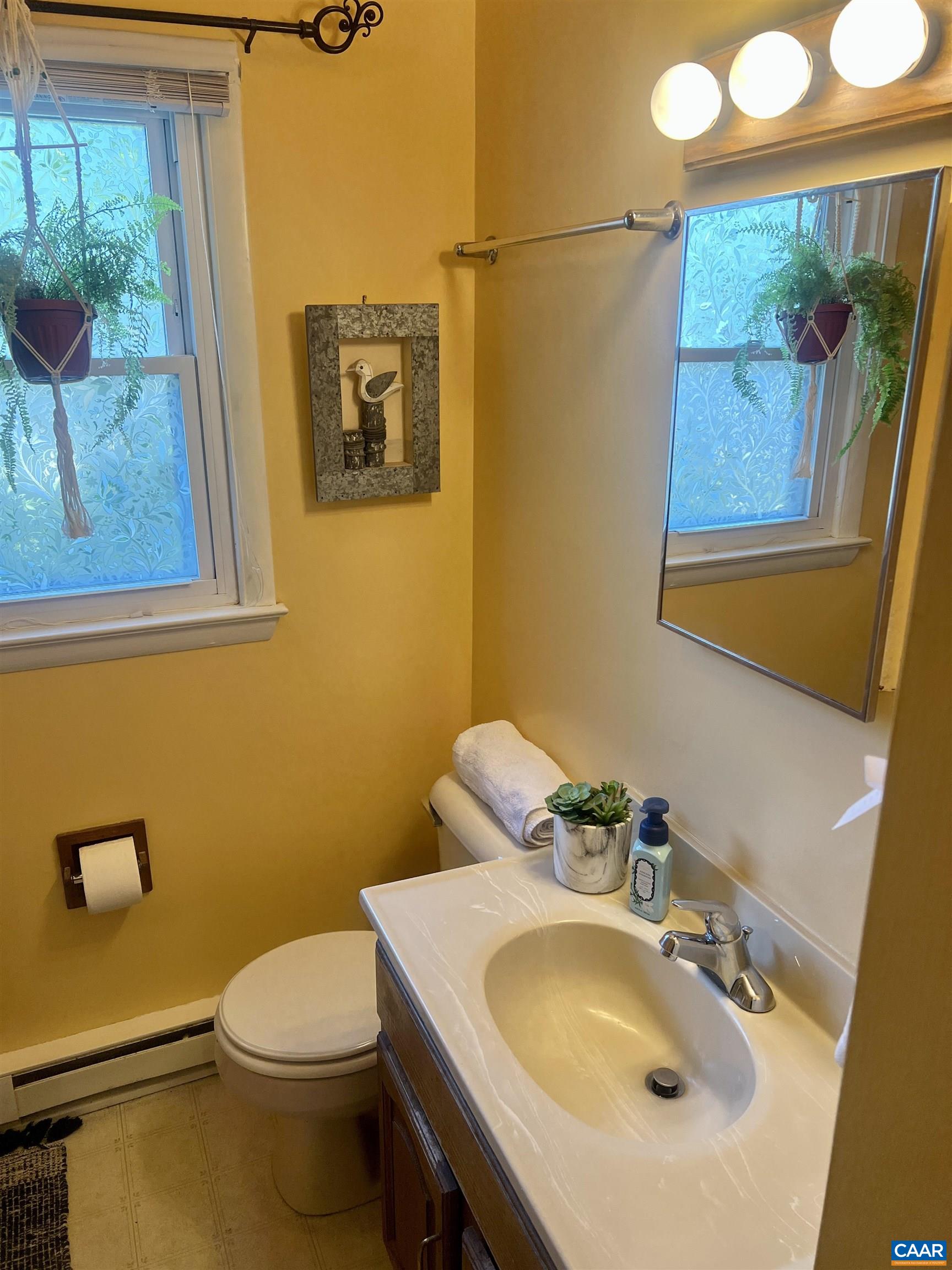 141 Quick's Mill Road Verona, VA 24482 - Photo 42 of 70 a bathroom with a sink and a toilet