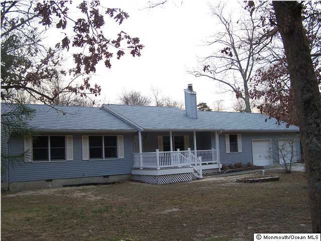 177 Thompson Bridge Road Jackson, NJ 08527 - Photo 1 of 3 a front view of a house with garage