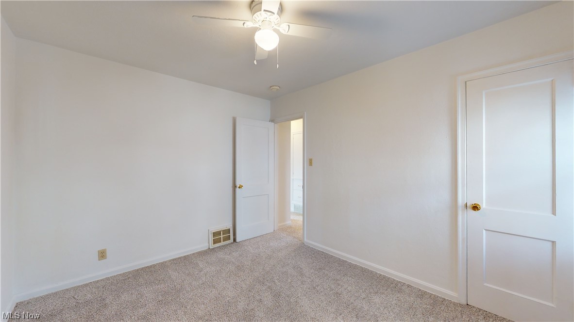 804 Kickapoo Avenue Akron, OH 44305 - Photo 10 of 24 Another view of the master bedroom. There are hardwood floors under the carpet.