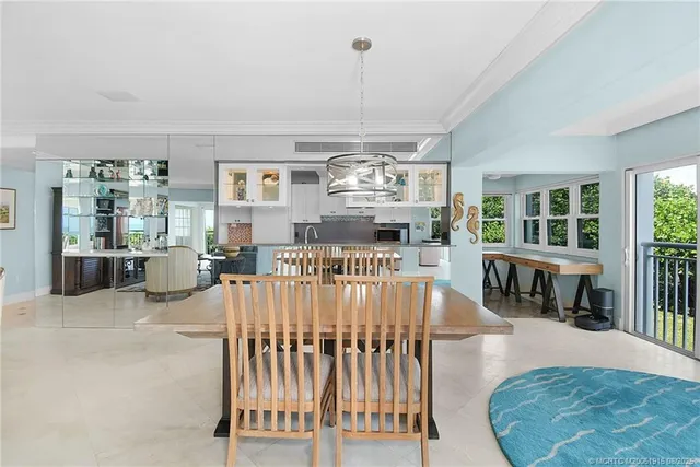 a living room with furniture fireplace and a window