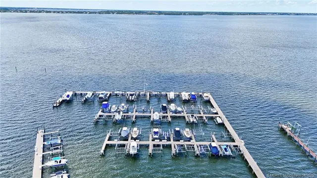 a aerial view of a house with wooden floor
