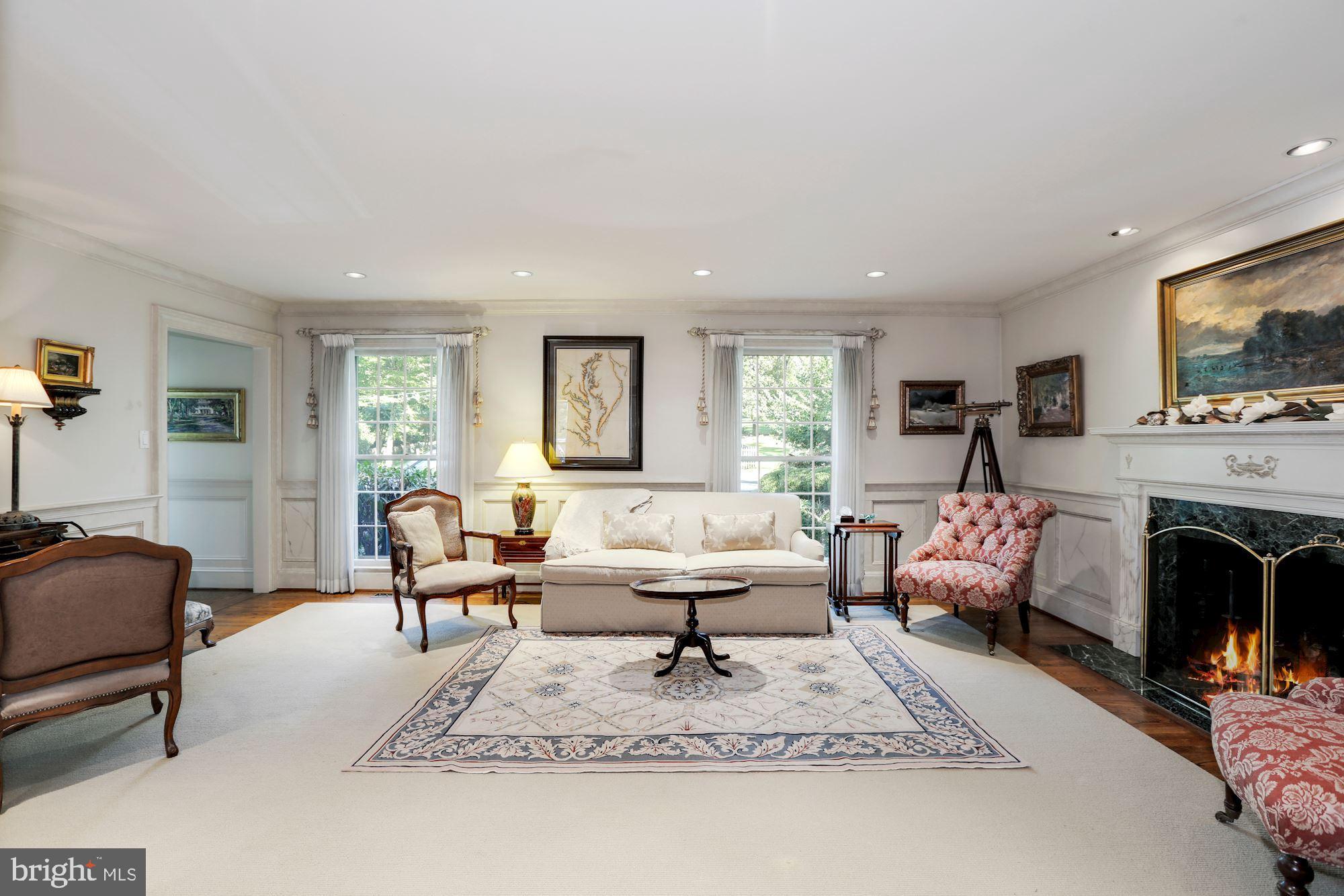 9409 Brooke Drive Bethesda, MD 20817 - Photo 11 of 47 Welcoming living room complete with fireplace