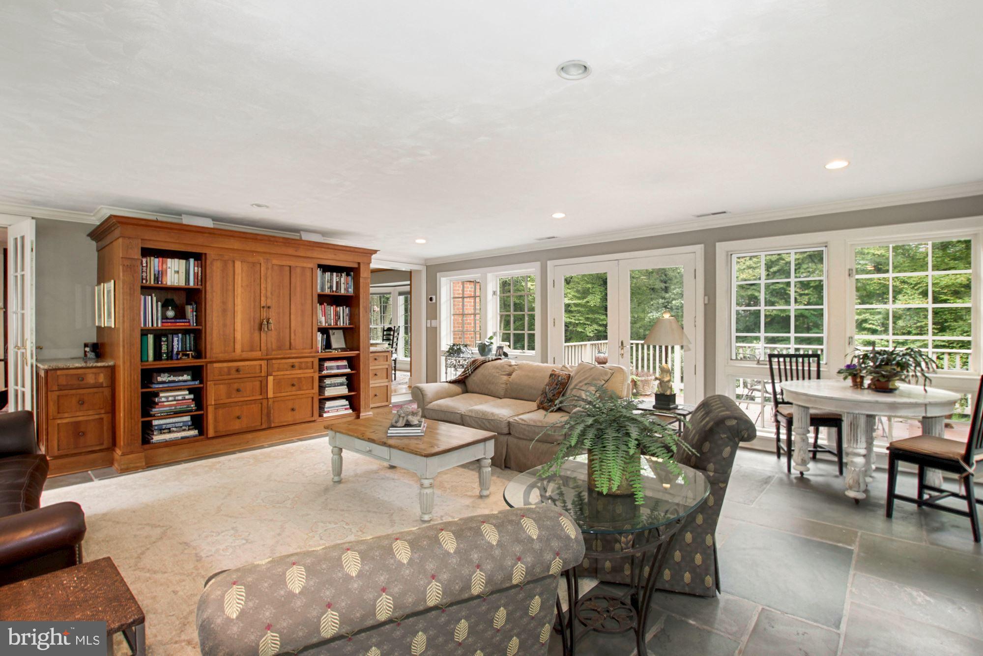 9409 Brooke Drive Bethesda, MD 20817 - Photo 15 of 47 Sun room / Family room French doors to deck