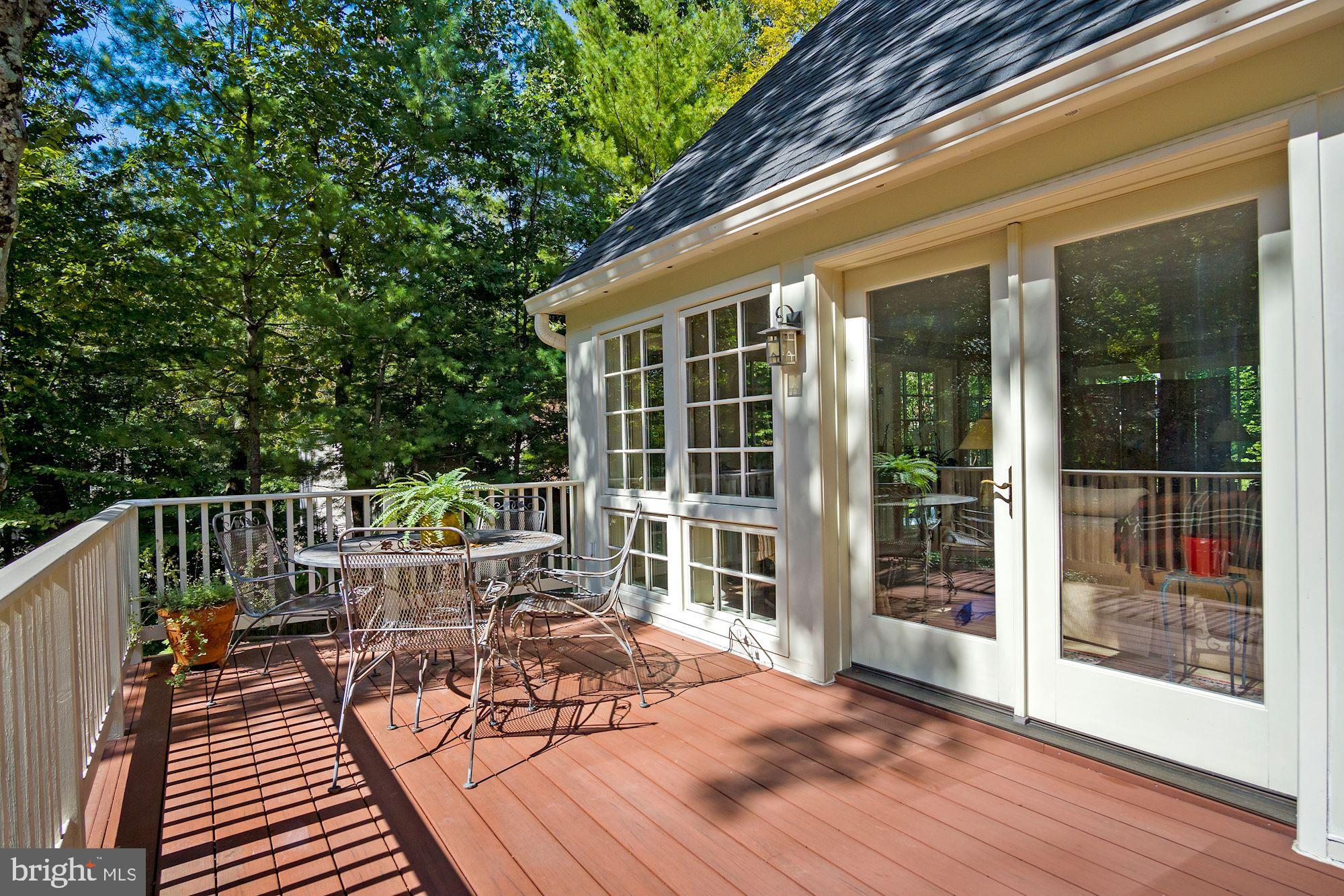 9409 Brooke Drive Bethesda, MD 20817 - Photo 16 of 47 Glorious trex deck off Sun room