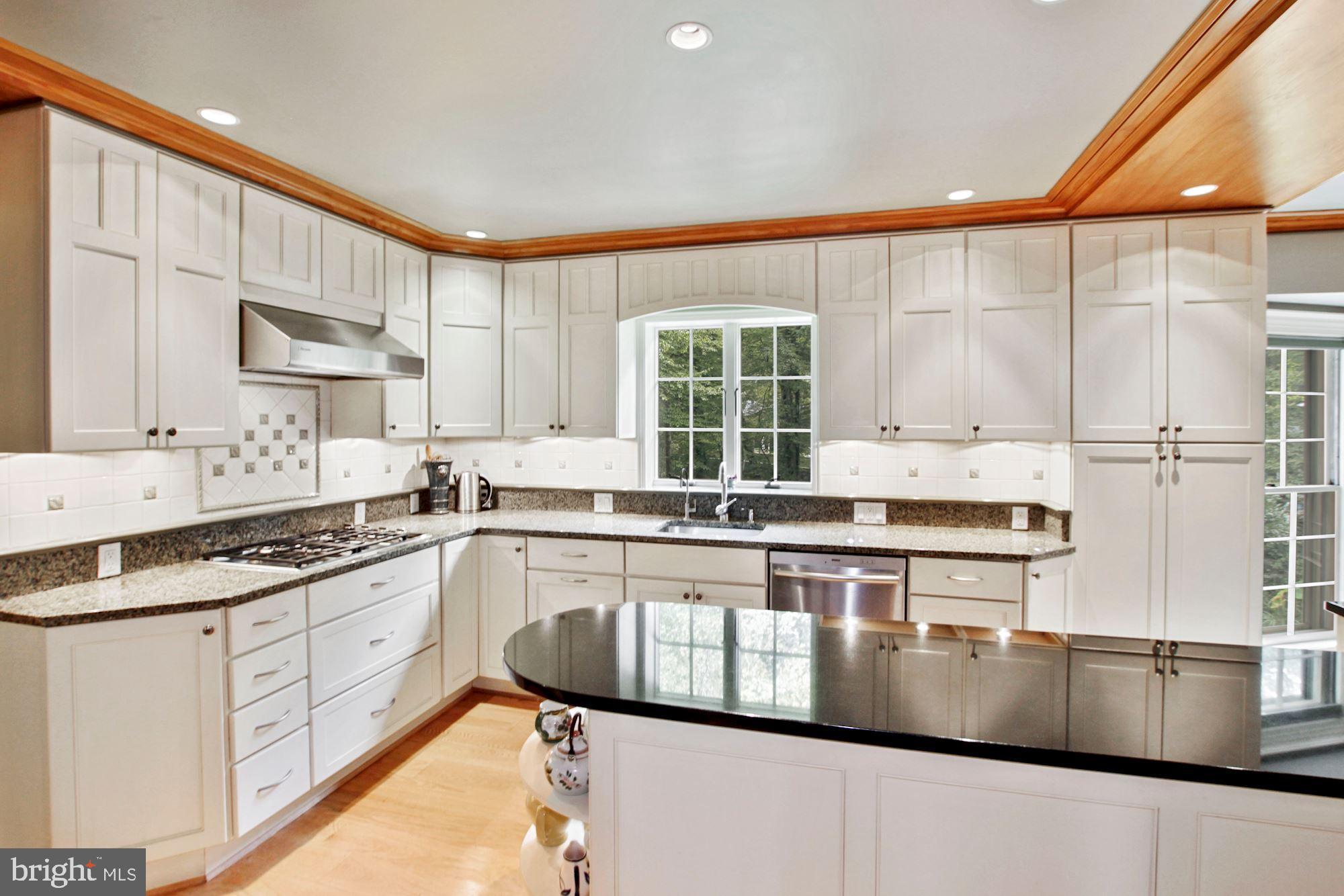 9409 Brooke Drive Bethesda, MD 20817 - Photo 18 of 47 Bright, open kitchen space with island