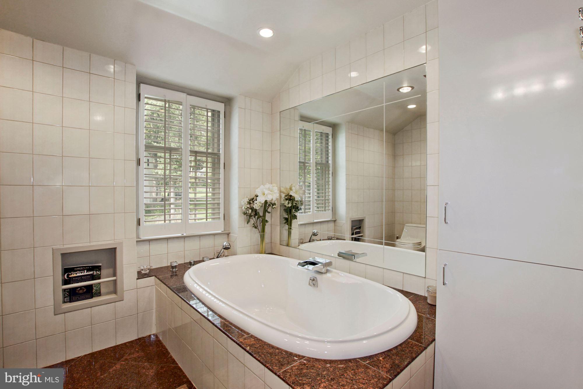 9409 Brooke Drive Bethesda, MD 20817 - Photo 25 of 47 Owner's spa bathroom