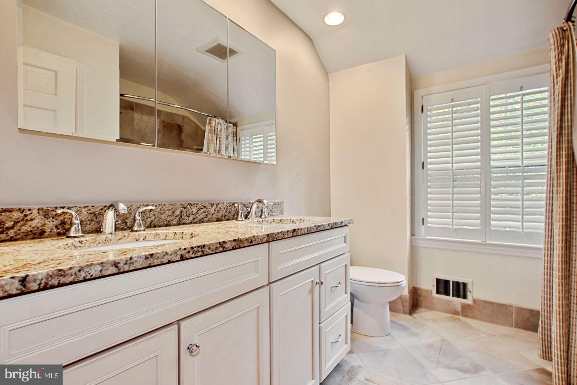 9409 Brooke Drive Bethesda, MD 20817 - Photo 34 of 47 Renovated full bathroom off 2nd level landing