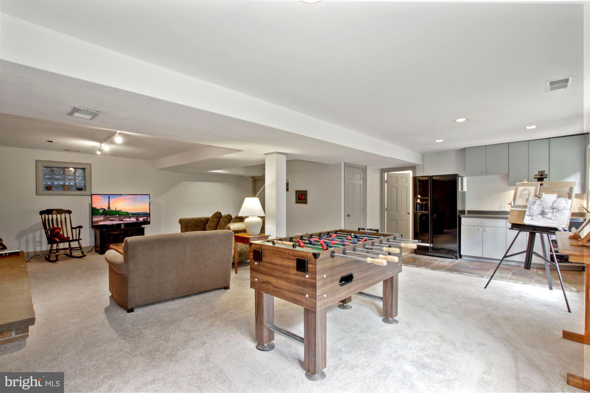 9409 Brooke Drive Bethesda, MD 20817 - Photo 35 of 47 Lower level full daylight game room