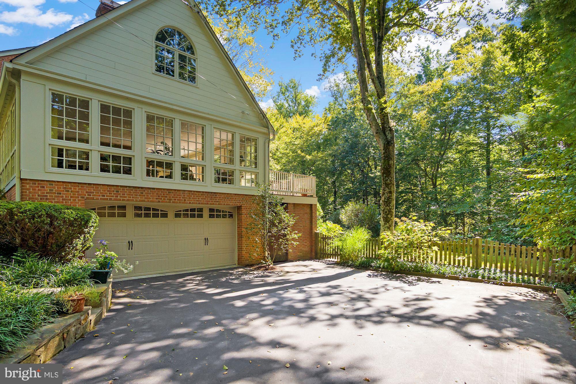 9409 Brooke Drive Bethesda, MD 20817 - Photo 5 of 47 Oversized 2 car garage integrated into lower level