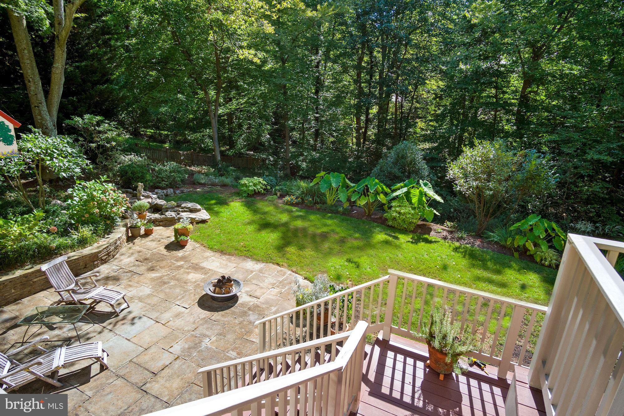 9409 Brooke Drive Bethesda, MD 20817 - Photo 7 of 47 Deck's grilling station down to flagstone patio