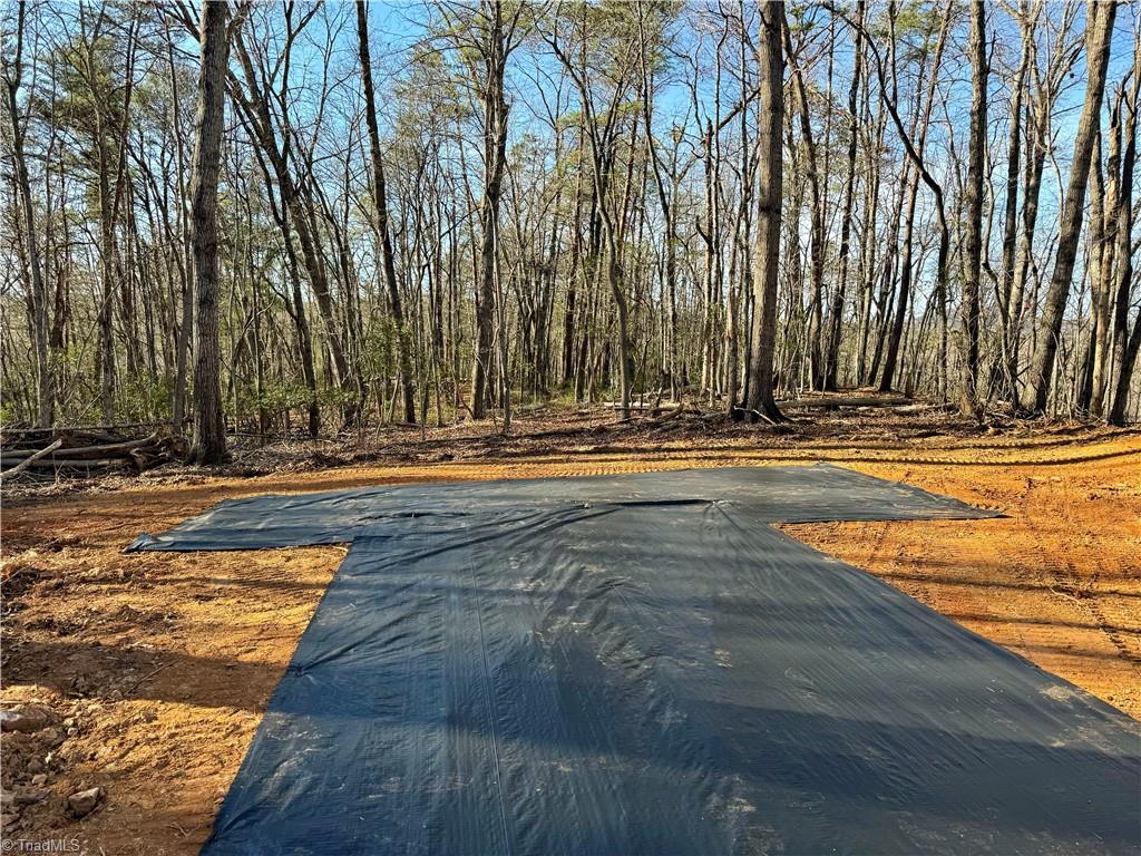 475 Fisher Valley Road Dobson, NC 27017 - Photo 39 of 50 2,100' of driveway built on top of geofabric to keep gravel from sinking over time able to take years of heavy traffic