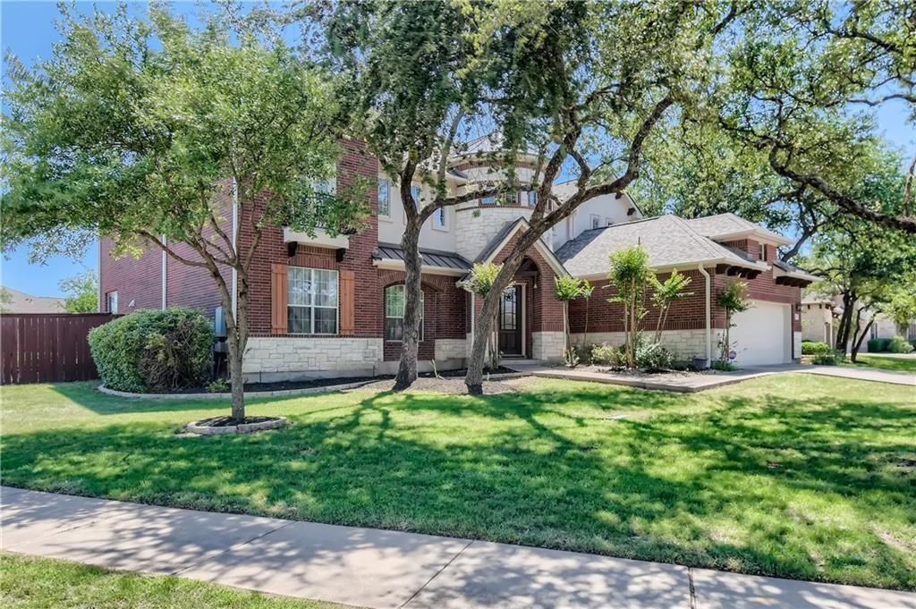 3822 Remington Road Cedar Park, TX 78613 - Photo 3 of 31 front view of a house with a yard