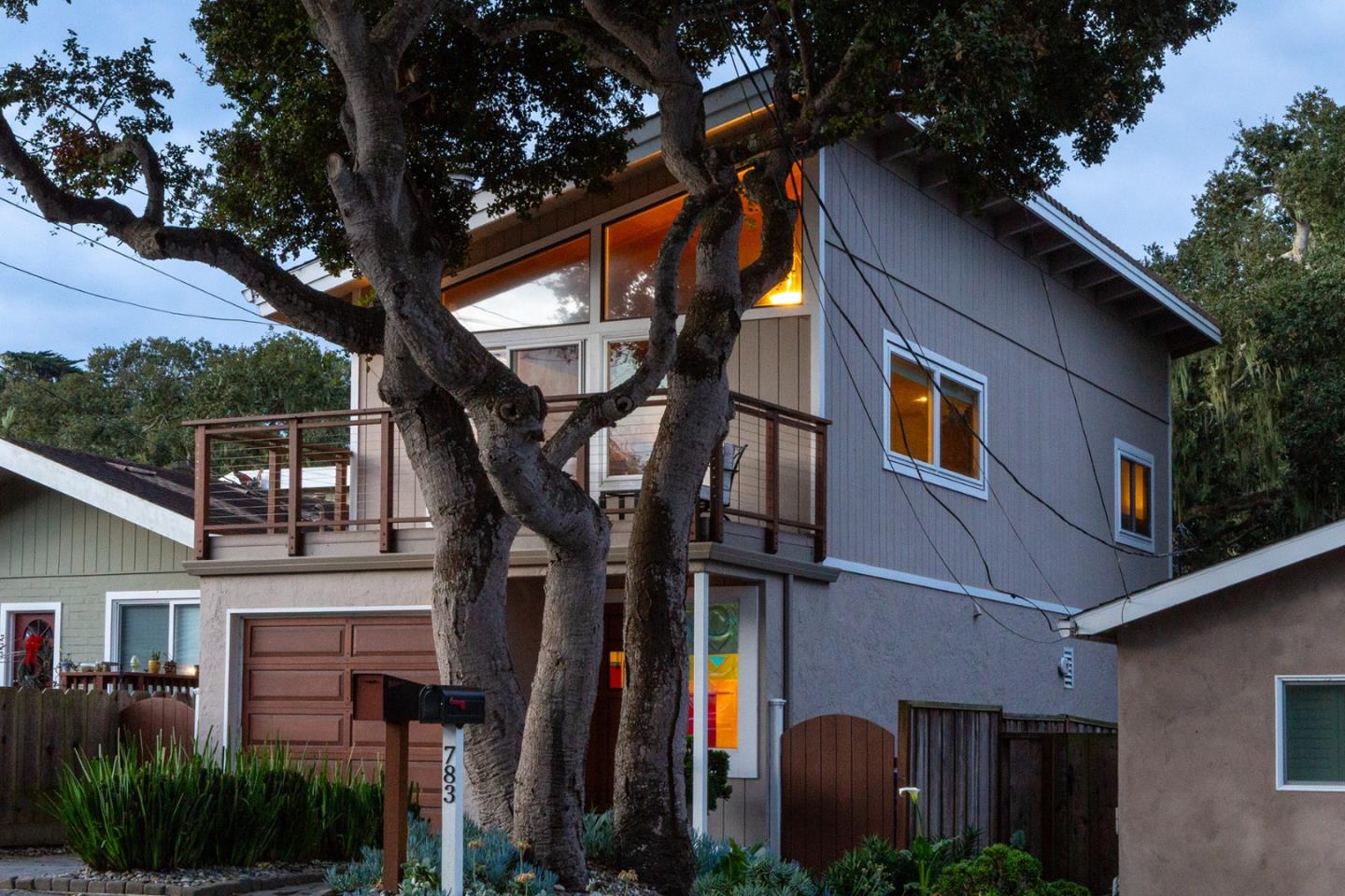 779 Alice Street Monterey, CA 93940 - Photo 3 of 27 a view of a building with a tree
