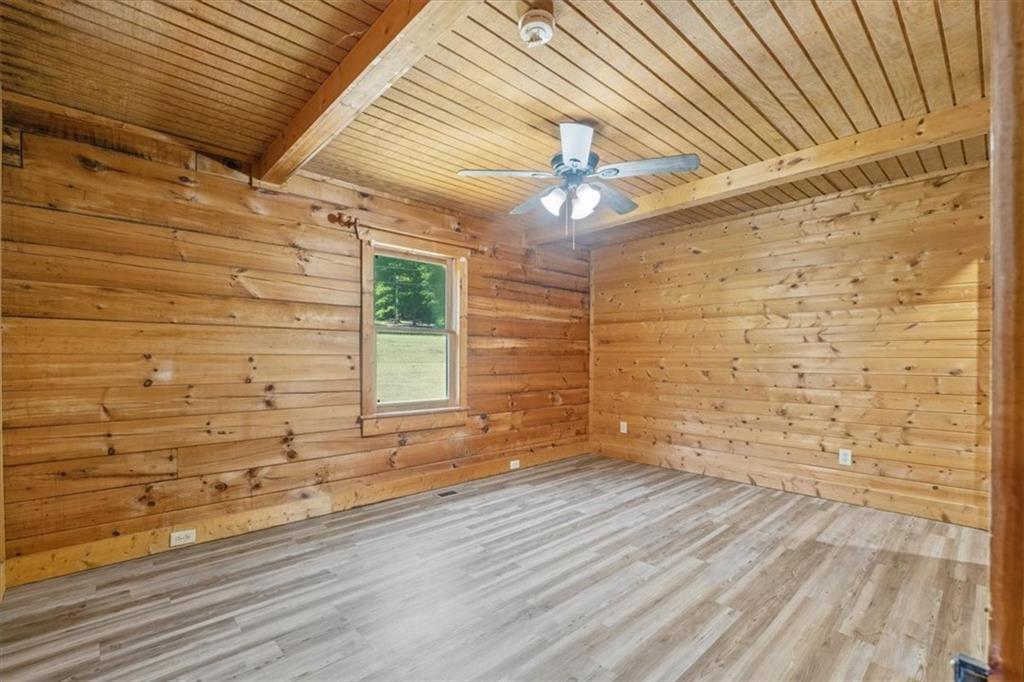 910 Brushtown Road Cisco, GA 30708 - Photo 12 of 30 a view of empty room with wooden floor