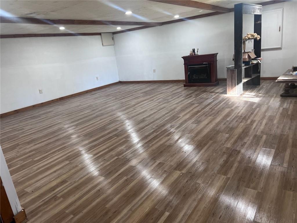 910 Brushtown Road Cisco, GA 30708 - Photo 26 of 30 a view of empty room with wooden floor