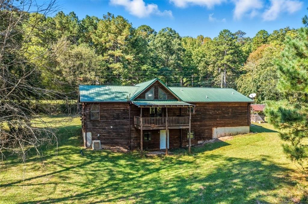 910 Brushtown Road Cisco, GA 30708 - Photo 7 of 30 a view of a house with a yard