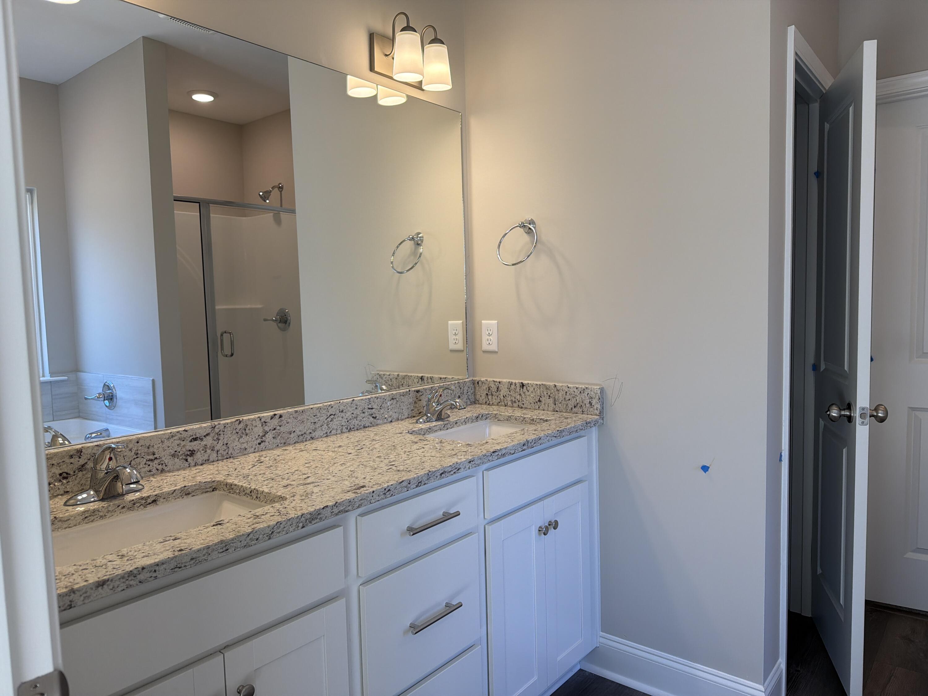 1371 Elias Way Thomson, GA 30824 - Photo 13 of 20 Double vanity with hard surface top