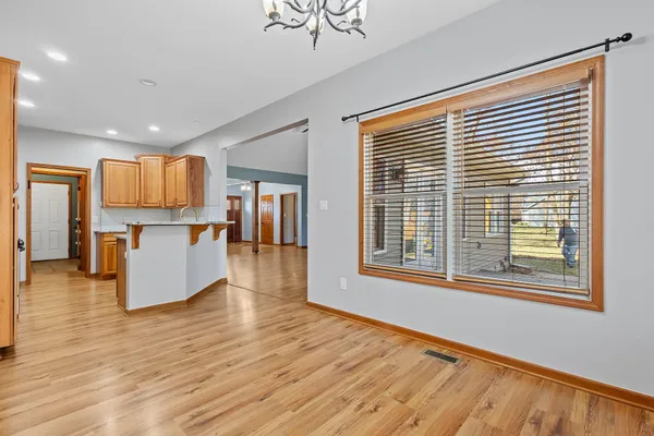 a view of an empty room with closet area