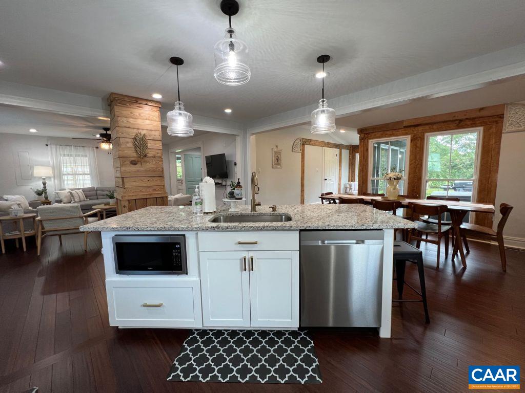 161 Avon Road Afton, VA 22920 - Photo 11 of 39 a kitchen with a sink stove and cabinets