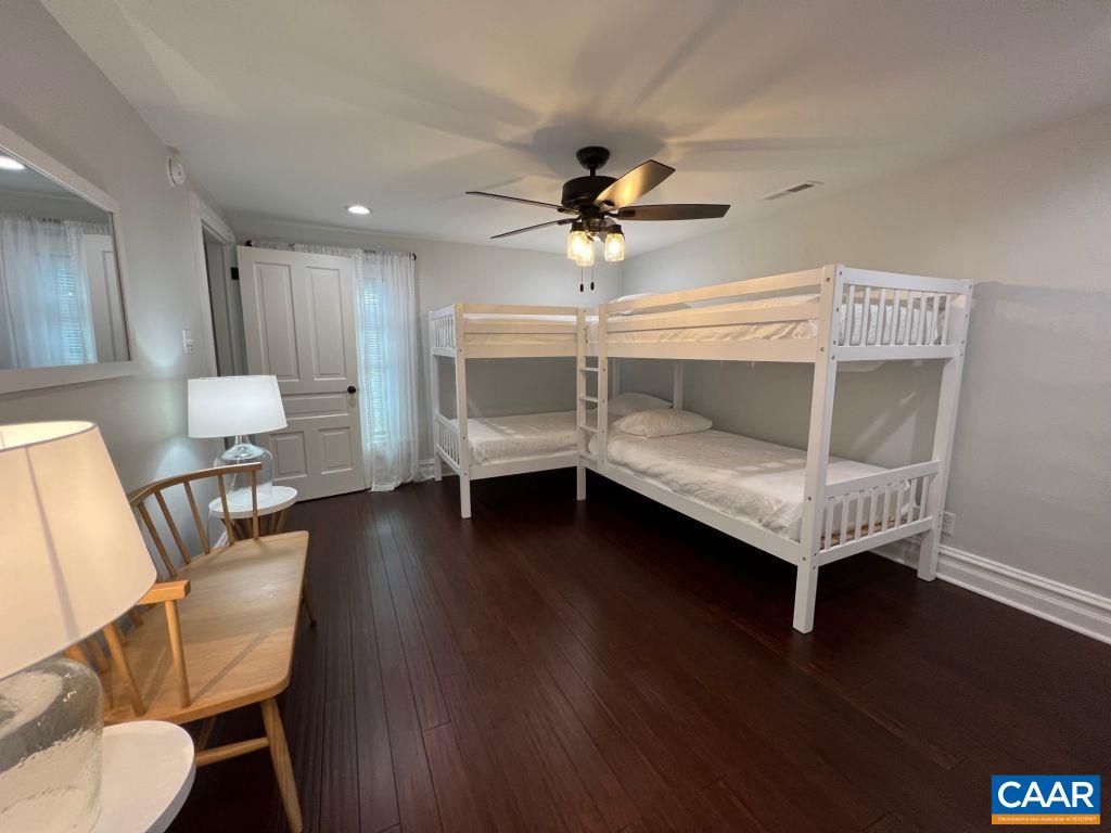 161 Avon Road Afton, VA 22920 - Photo 14 of 39 a bedroom with furniture and a ceiling fan