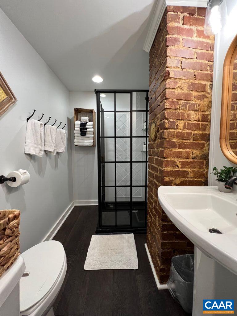 161 Avon Road Afton, VA 22920 - Photo 15 of 39 a bathroom with a sink toilet and shower