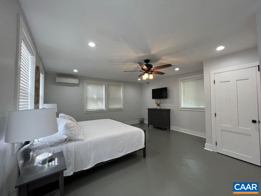 161 Avon Road Afton, VA 22920 - Photo 32 of 39 a bedroom with a bed and a tv