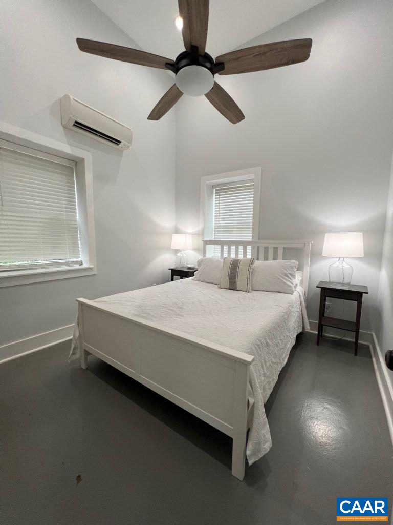 161 Avon Road Afton, VA 22920 - Photo 36 of 39 a bedroom with a bed and a ceiling fan