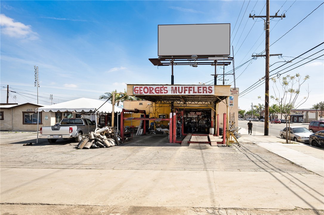 4313 Florence Avenue Bell, CA 90201 - Photo 1 of 5 a view of a building with cars