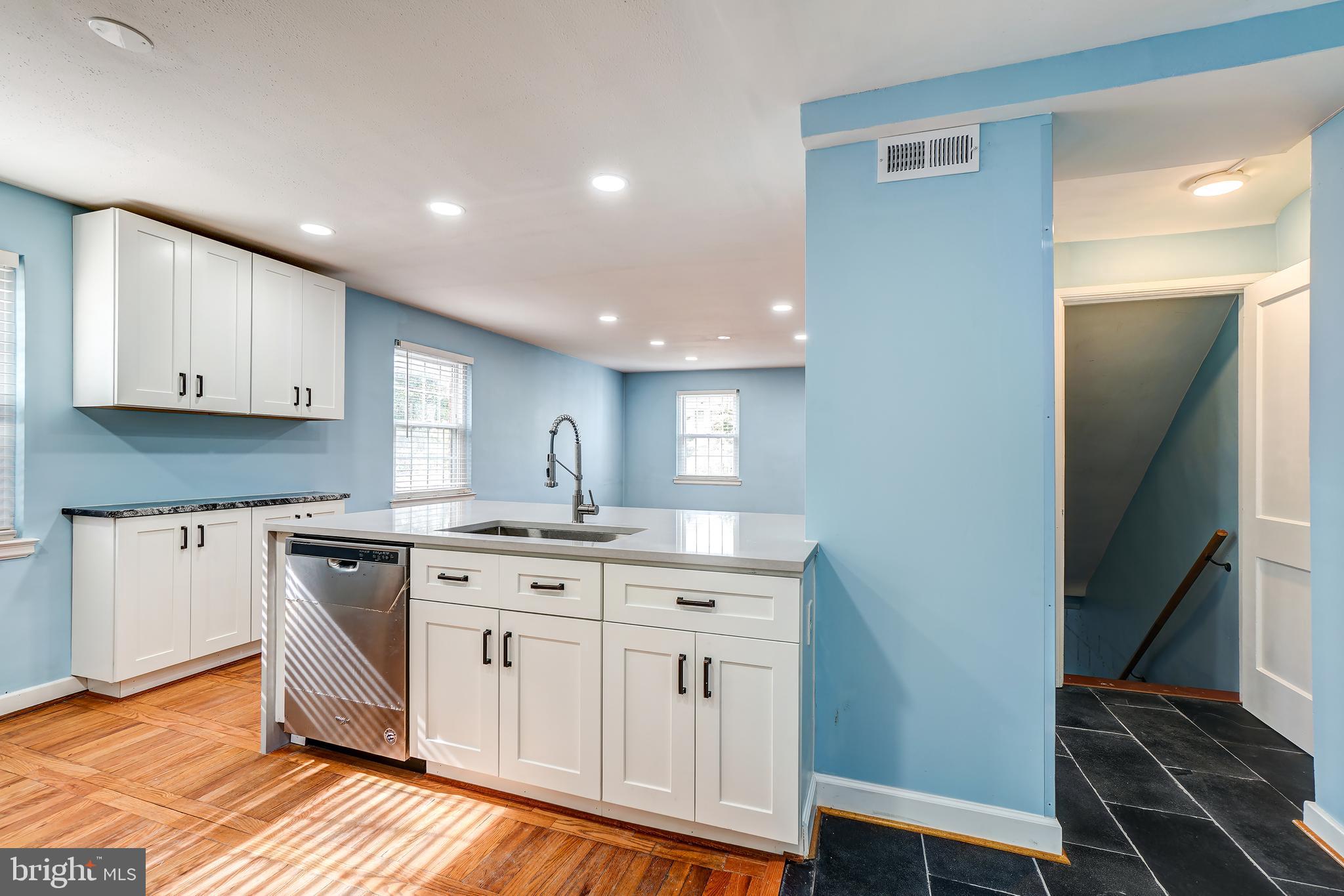 849 South Glebe Road Arlington, VA 22204 - Photo 13 of 45 Kitchen stairs lead to fully-finished basement