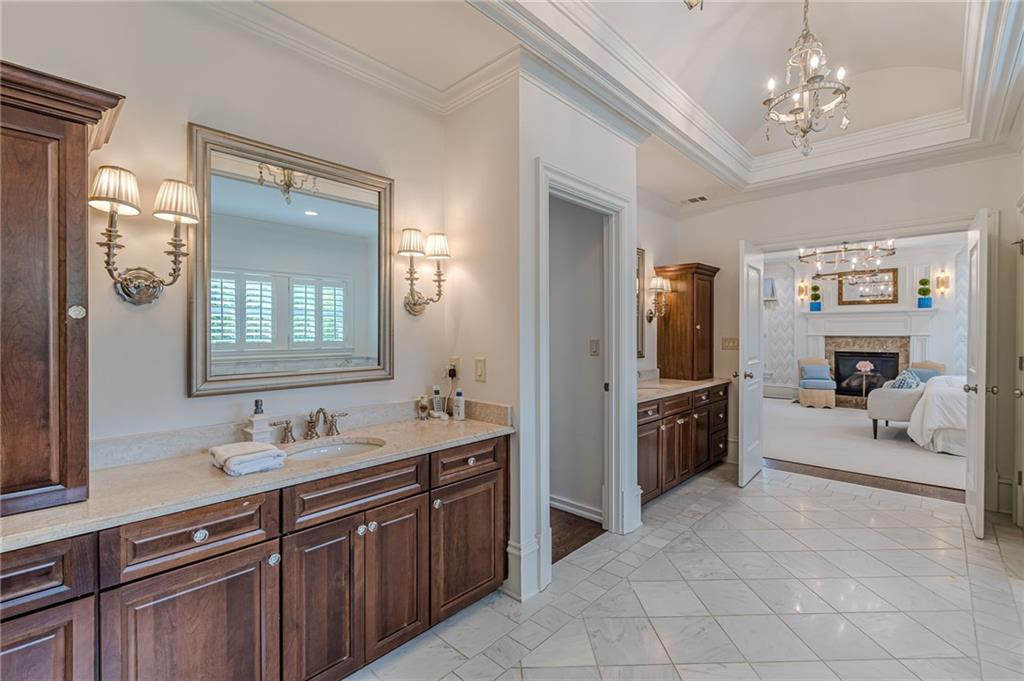 2010 Caladium Way Roswell, GA 30075 - Photo 30 of 71 a spacious bathroom with a sink double vanity and a mirror