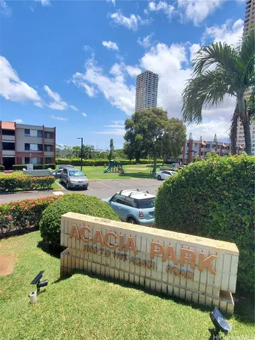 a view of a garden with houses