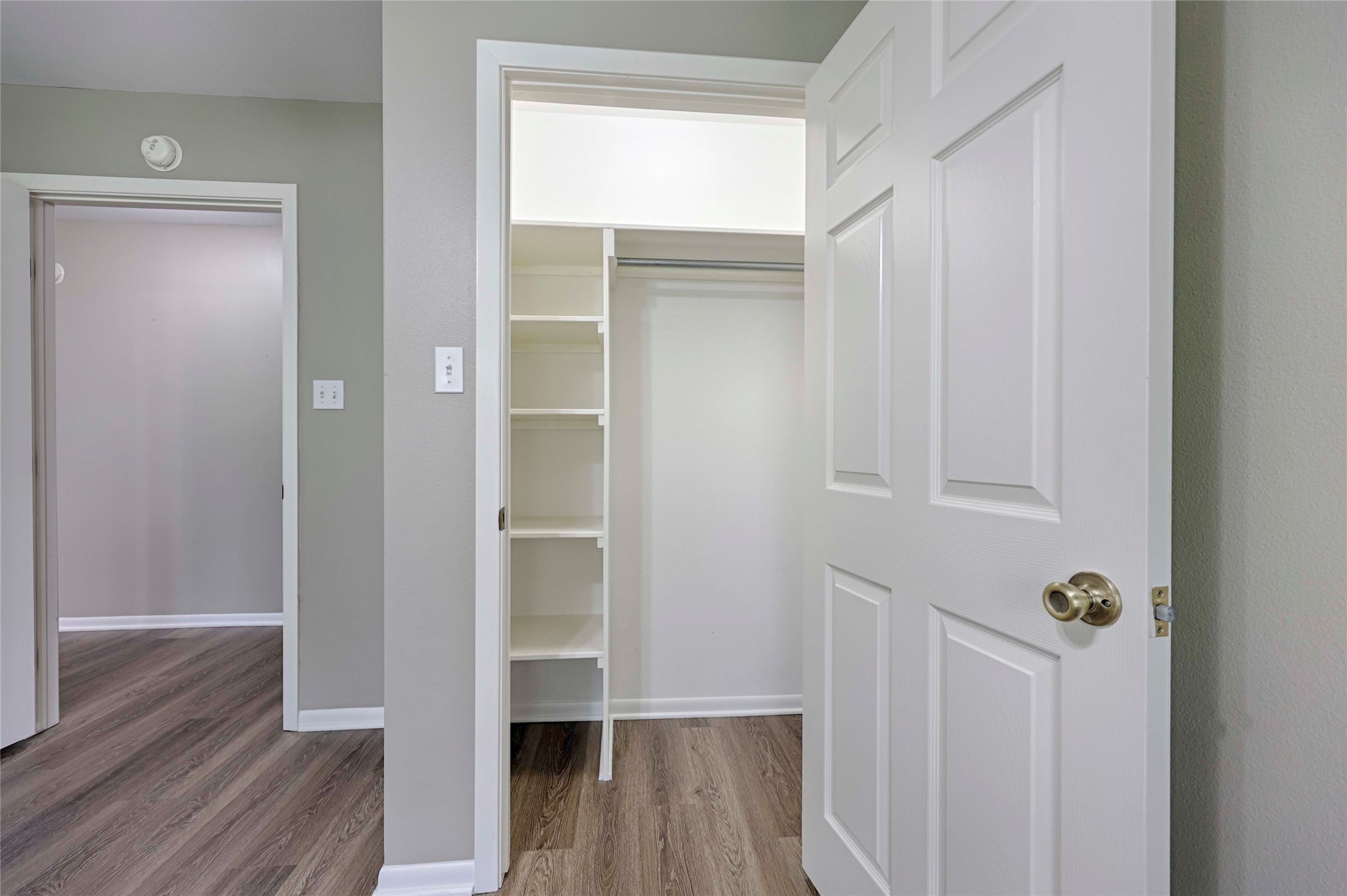 3545 East I- 10 Frontage Road Schulenburg, TX 78956 - Photo 22 of 40 a view of walk in closet with wooden floor