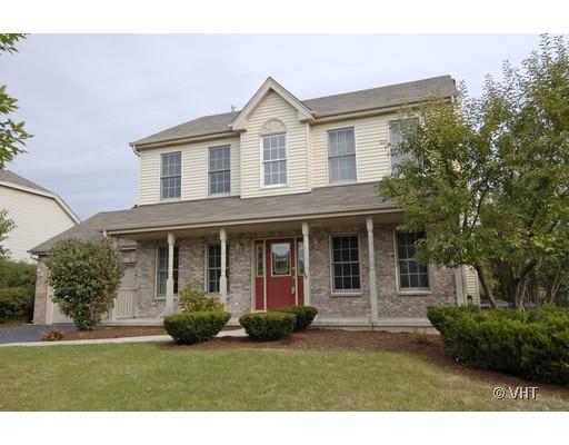 39W174 Bartelt Road Geneva, IL 60134 - Photo 1 of 1 a front view of a house with a garden