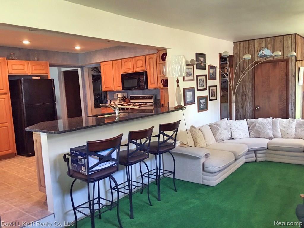 5881 Port Austin Road Caseville, MI 48725 - Photo 5 of 18 5881PtAustinKitchenToFamily.jpg