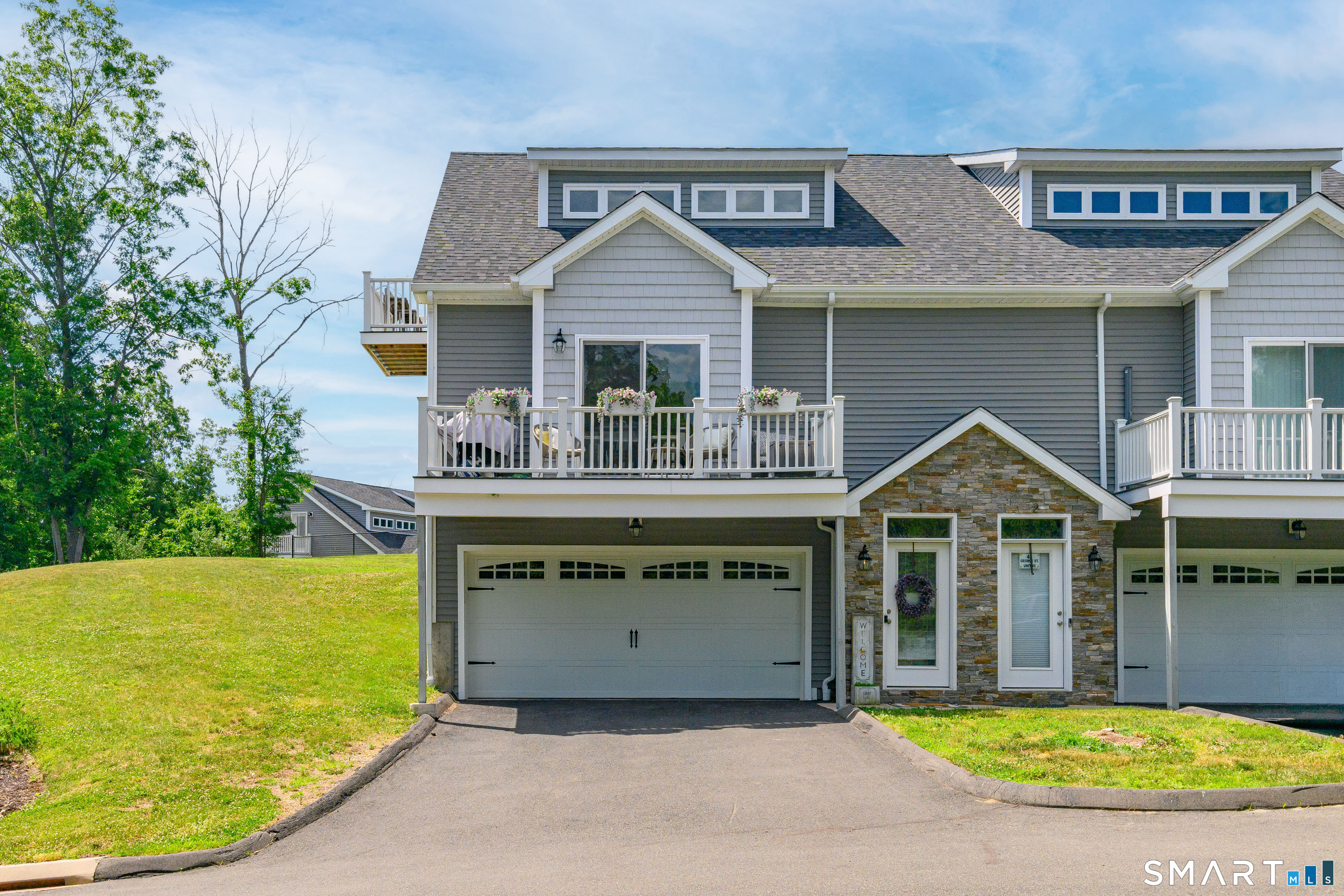 43 George Street, Unit 1 Seymour, CT 06483 - Photo 2 of 33 The first unit of this 10-unit condominium complex. An end unit with a balcony with view overlooking the town of Seymour!