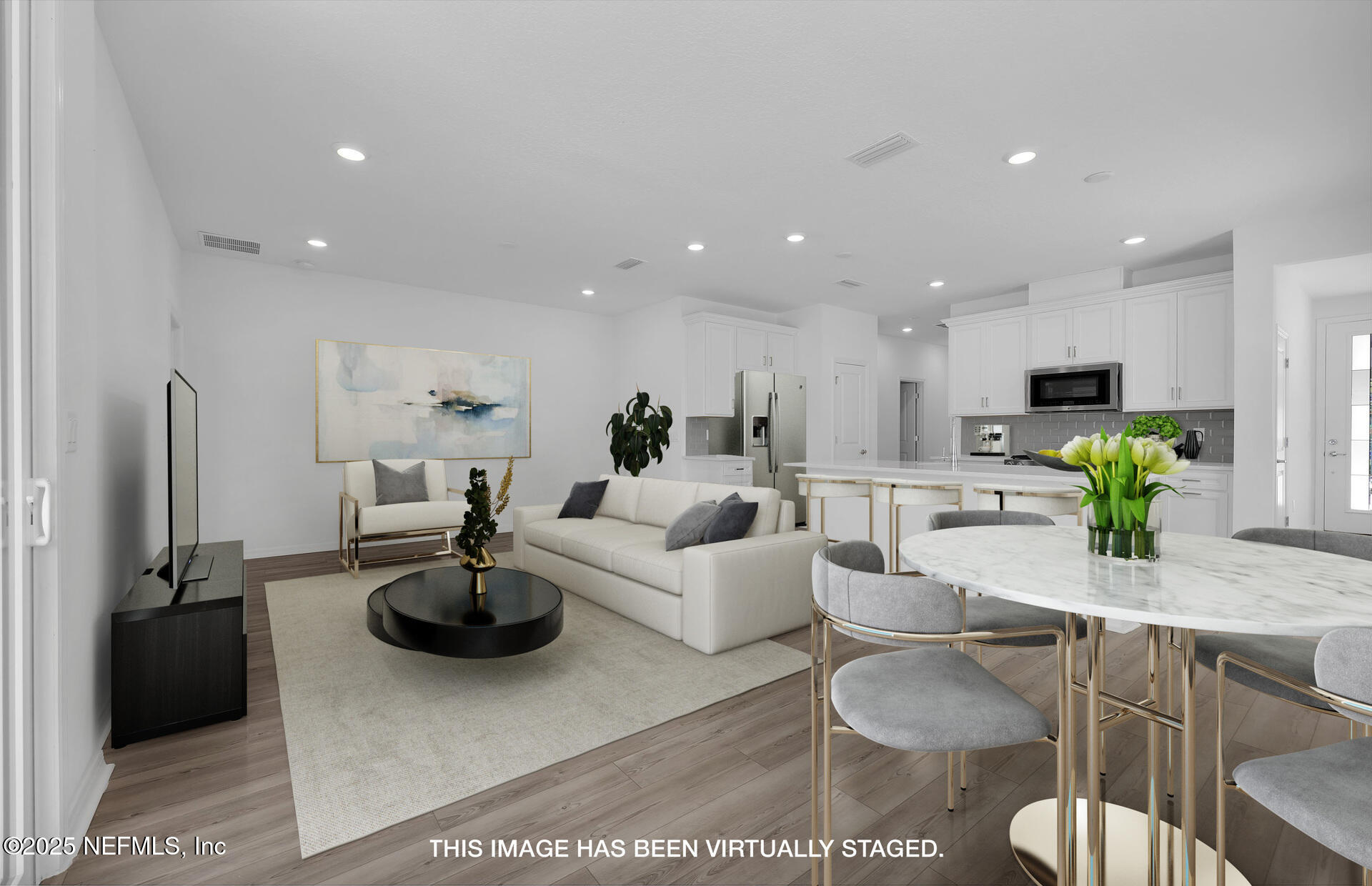 1749 Mickey Way Middleburg, FL 32068 - Photo 11 of 23 a living room with furniture kitchen view and a refrigerator