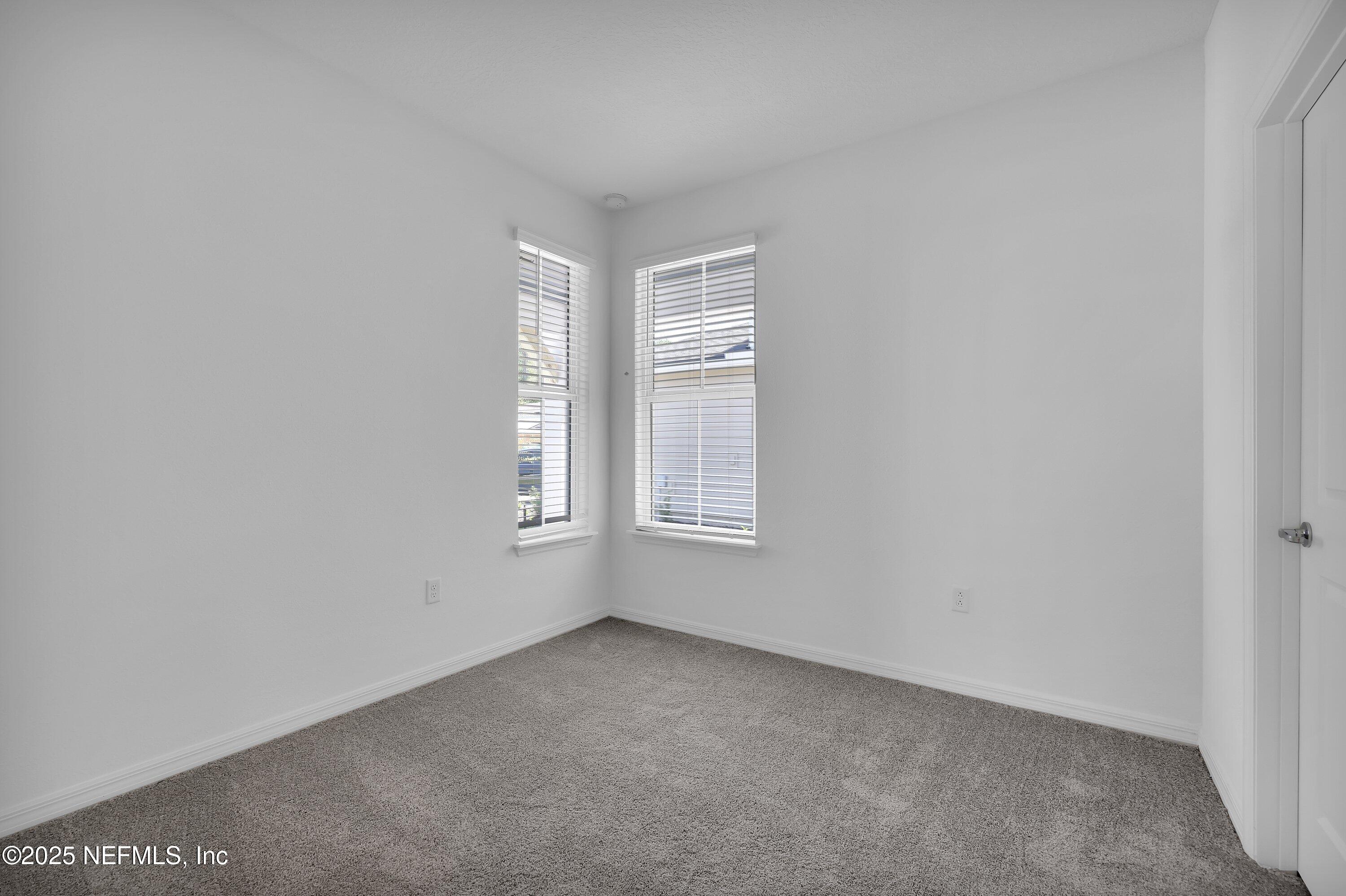 1749 Mickey Way Middleburg, FL 32068 - Photo 20 of 23 a view of an empty room with a window
