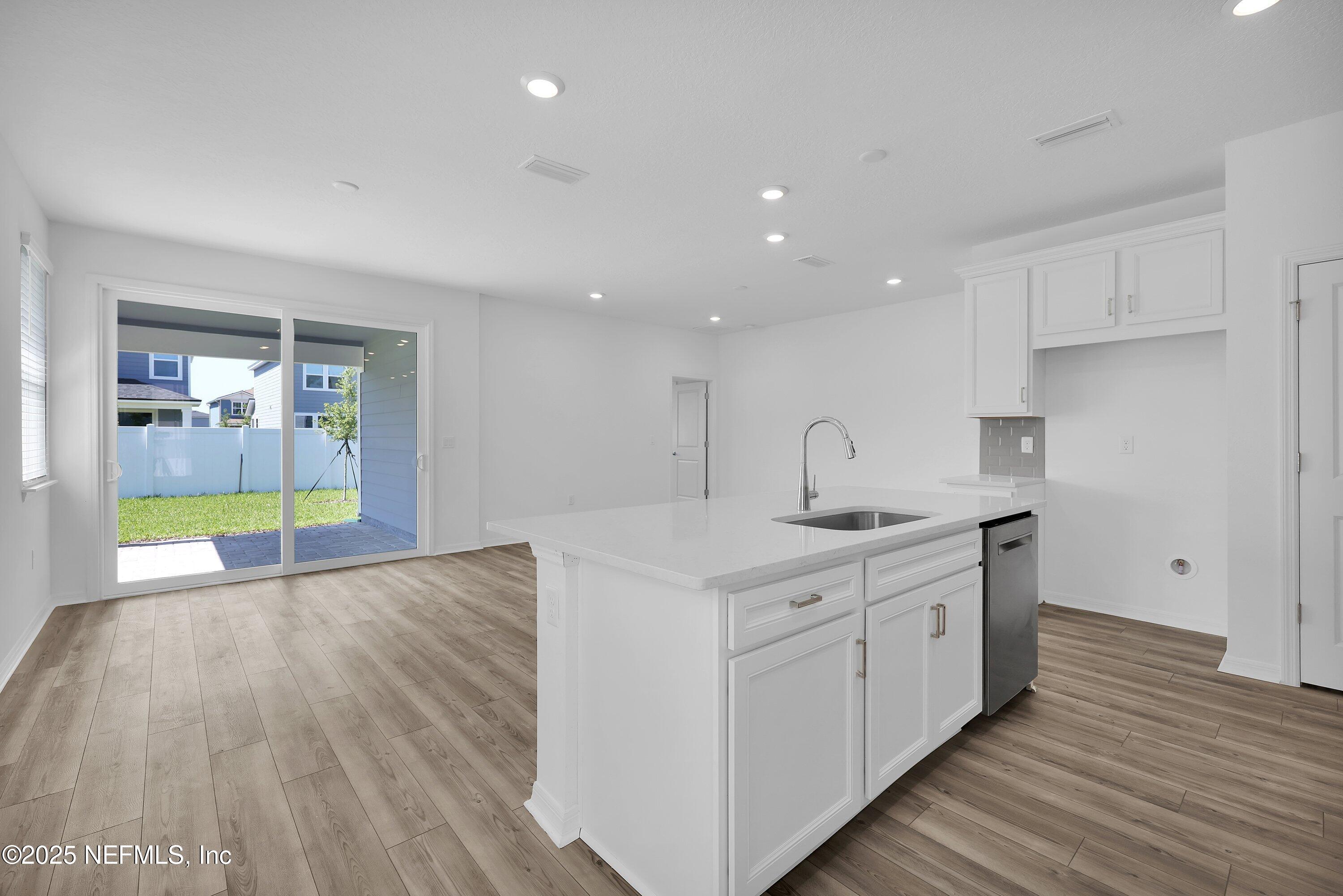 1749 Mickey Way Middleburg, FL 32068 - Photo 8 of 23 a kitchen with sink and cabinets