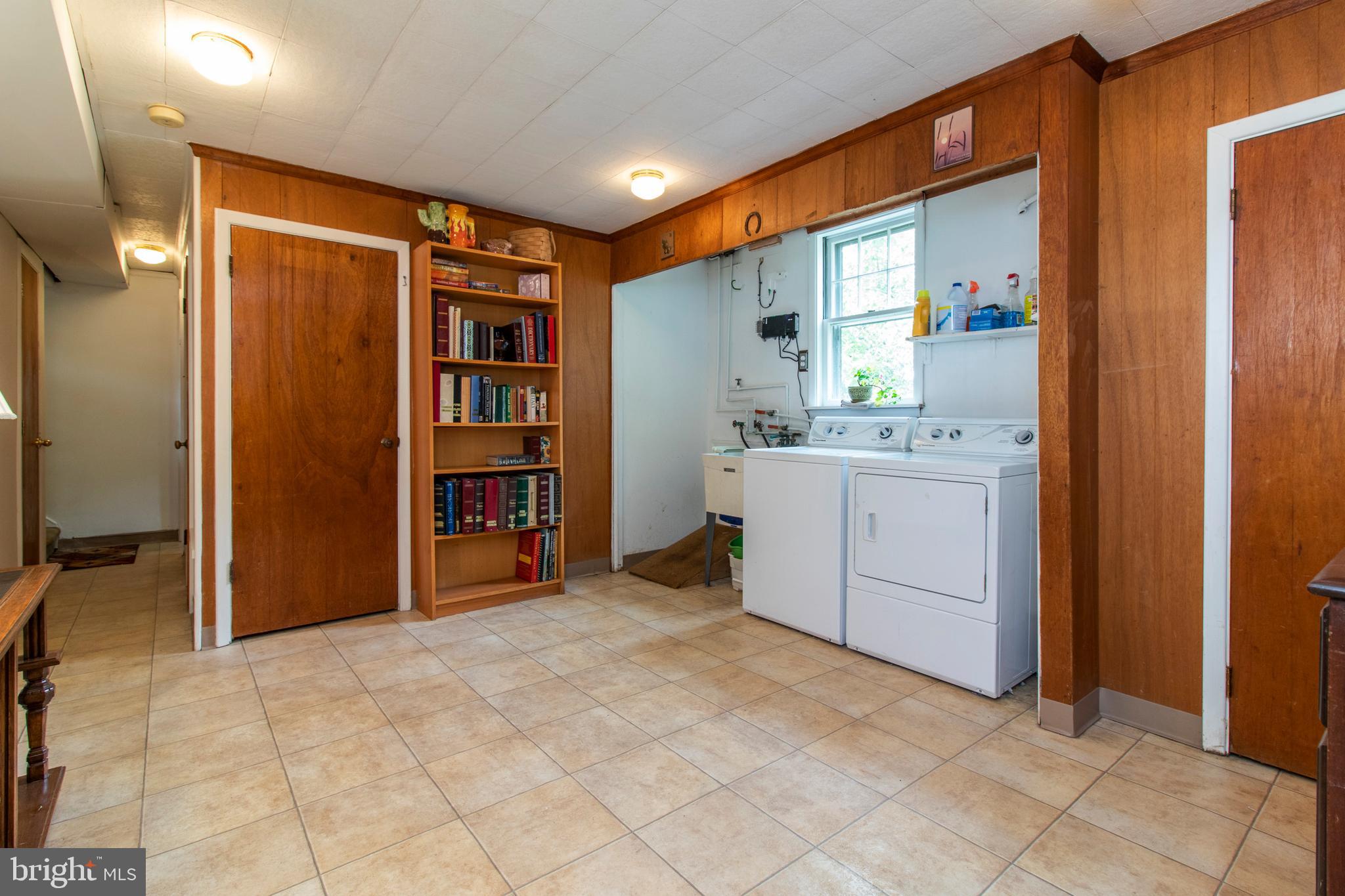 1705 Church Road Oreland, PA 19075 - Photo 26 of 35 Huge Laundry room with doggie door