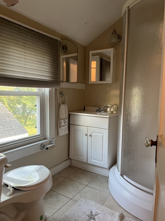 239 Plumtree Road Springfield, MA 01118 - Photo 11 of 14 a bathroom with a toilet sink and mirror